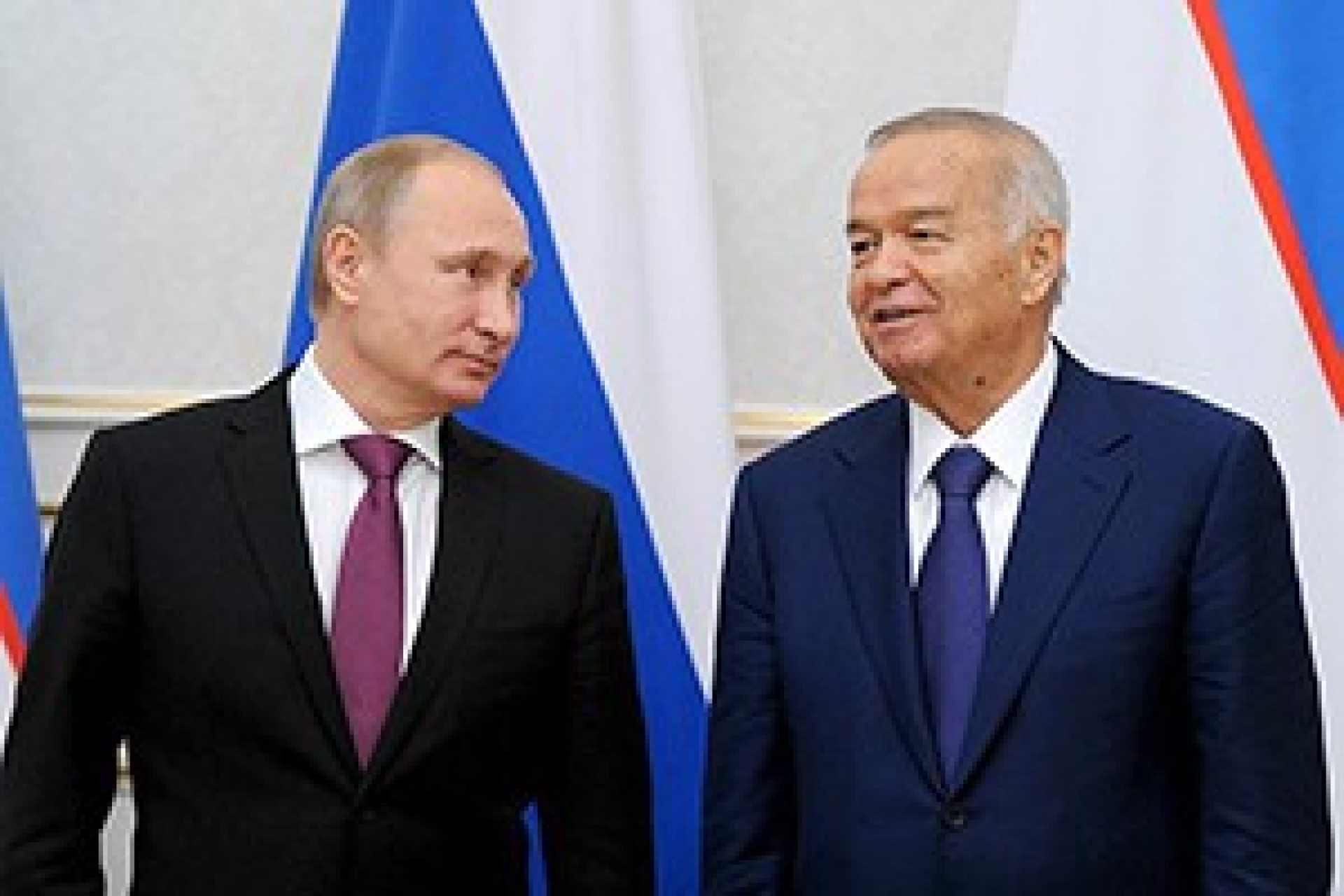 Путин поздравил Каримова с победой