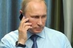 Путин провел телефонный разговор с Меркель и Олландом