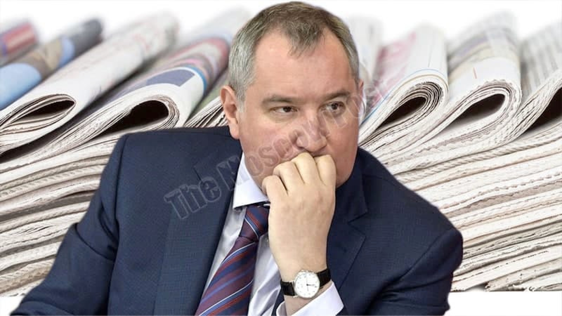 Рогозин "прикрывается" газеткой?