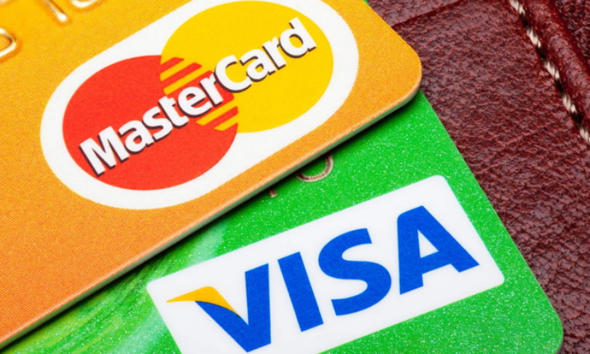 Попавшие под санкции банки не смогут выпускать карты Visa и Mastercard